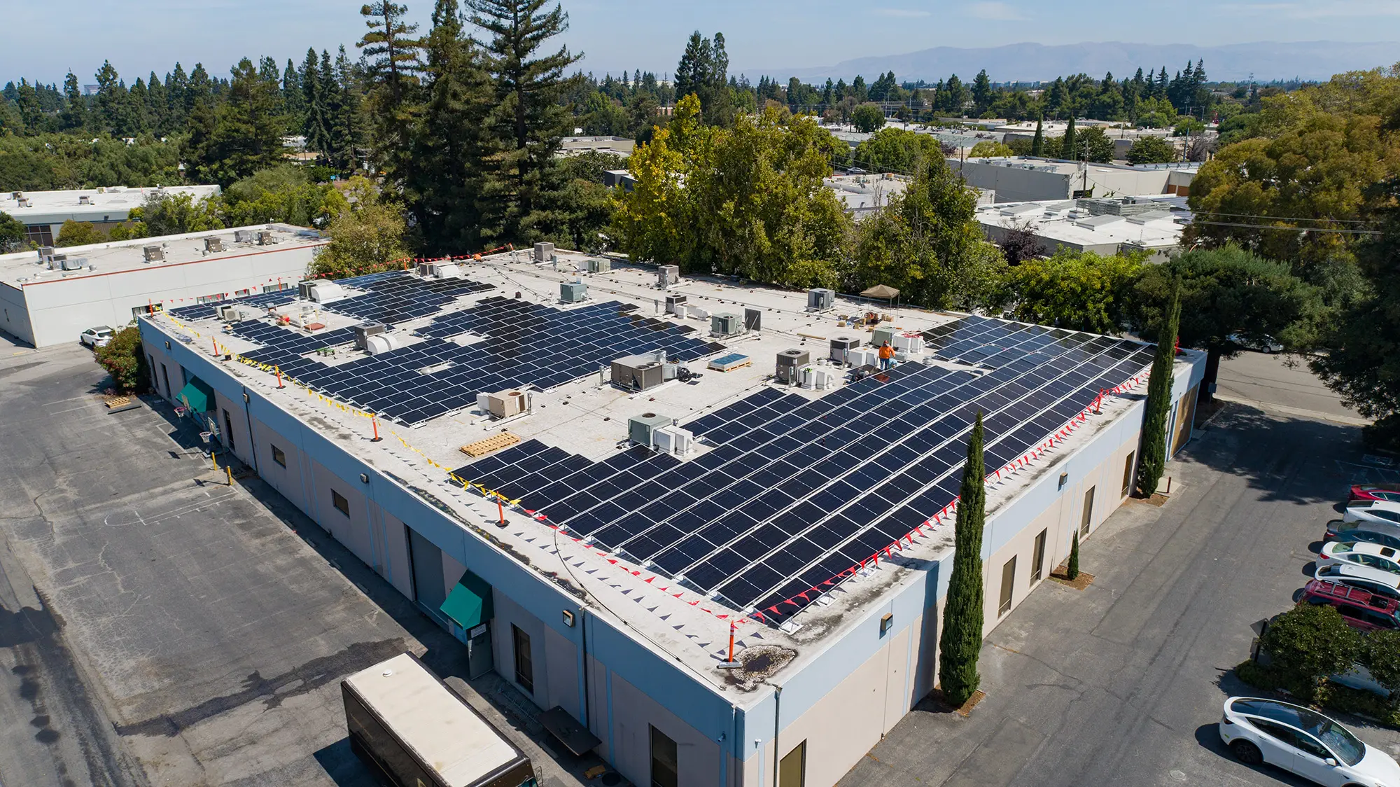 Aerial view of the Proteus Industries building and rooftop solar installation